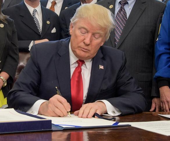 President Donald Trump Signs a Bill