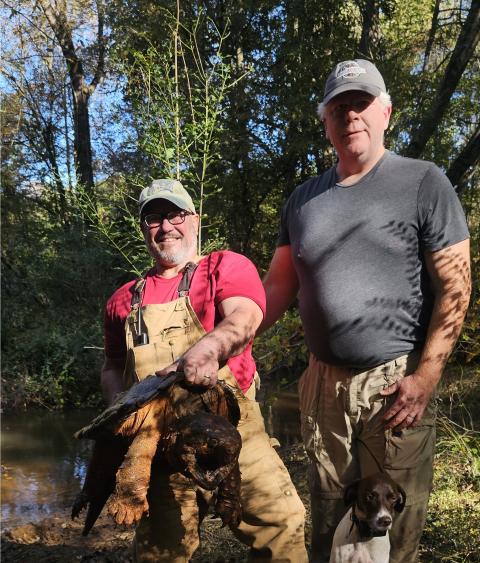 Leo Miranda-Castro and USFWS staff with Alligator Snapping Turtle on Working Forest