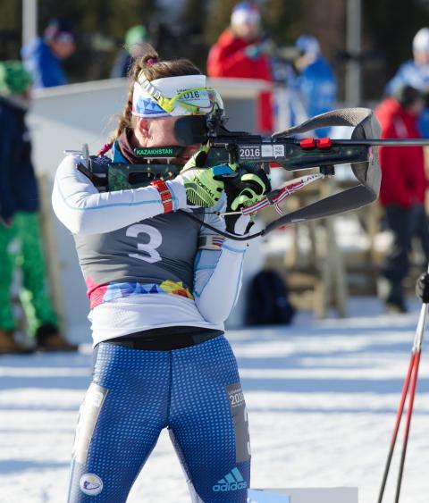 Biathlon participants in action