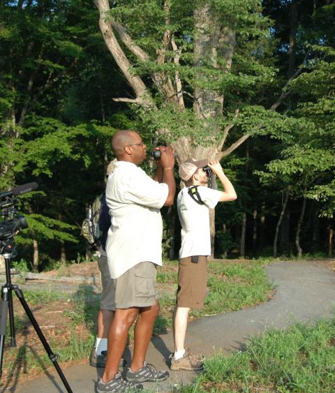 Dr. Drew Lanham with others birdwatching