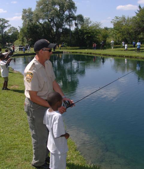 A child participates in Ohio free fishing weekend