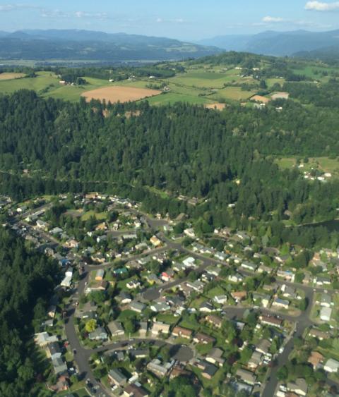 Aerial photo of the Sandy River in Oregon separating urban and rural areas