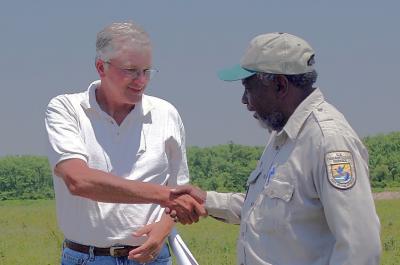 conservation collaborators shaking hands