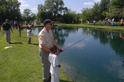 A child participates in Ohio free fishing weekend