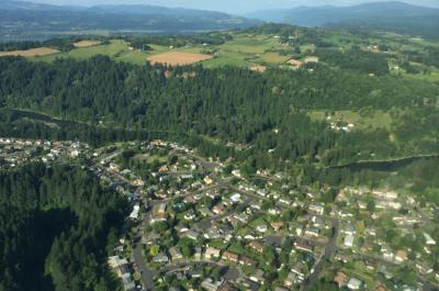 Aerial photo of the Sandy River in Oregon separating urban and rural areas