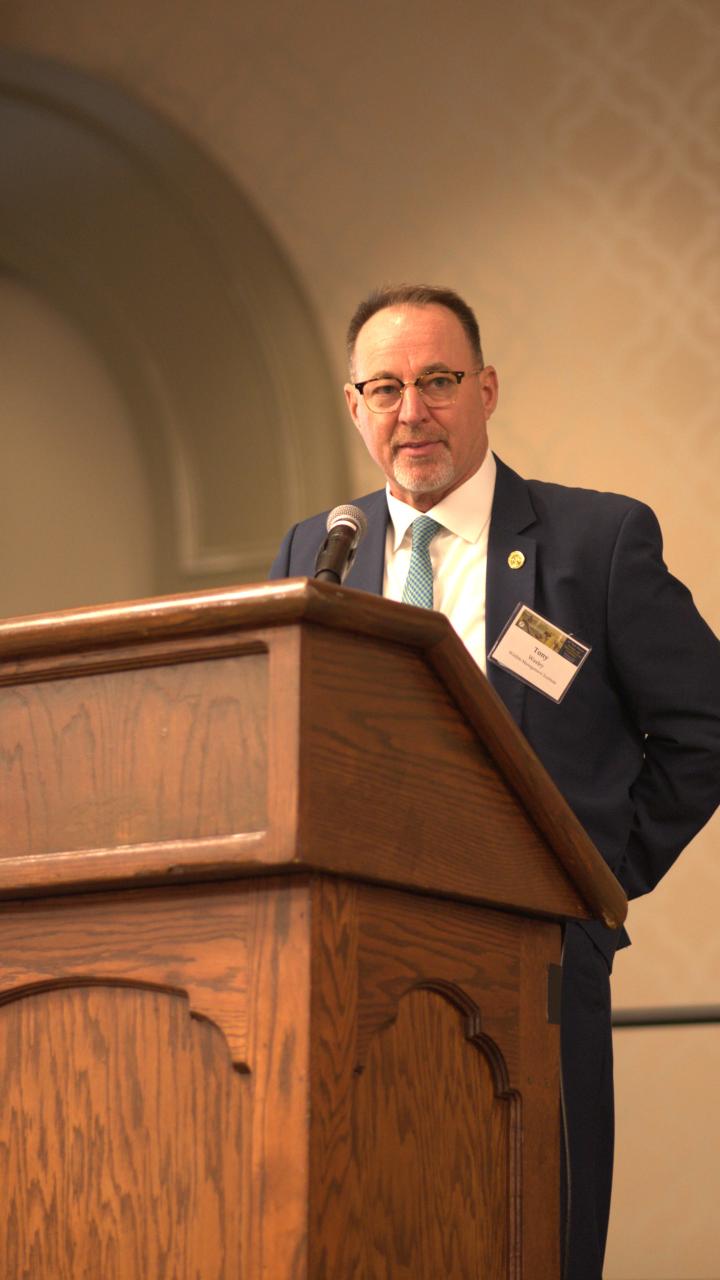 Tony Wasley delivering remarks at 90th North American conference