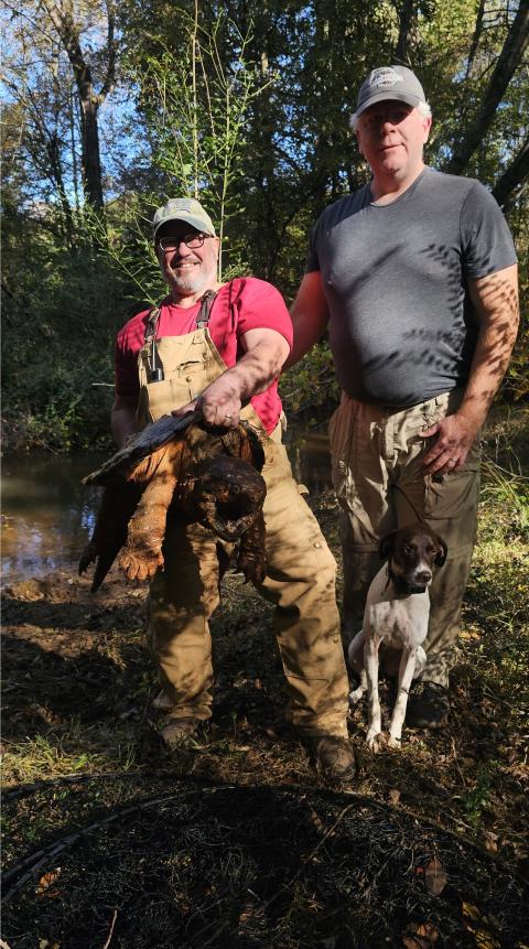 Leo Miranda-Castro and USFWS staff with Alligator Snapping Turtle on Working Forest